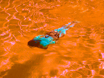 Woman lava-swimming